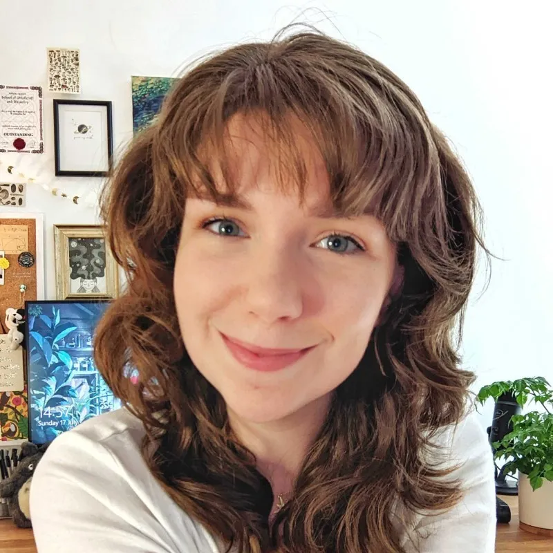 A close-up headshot of Amy.