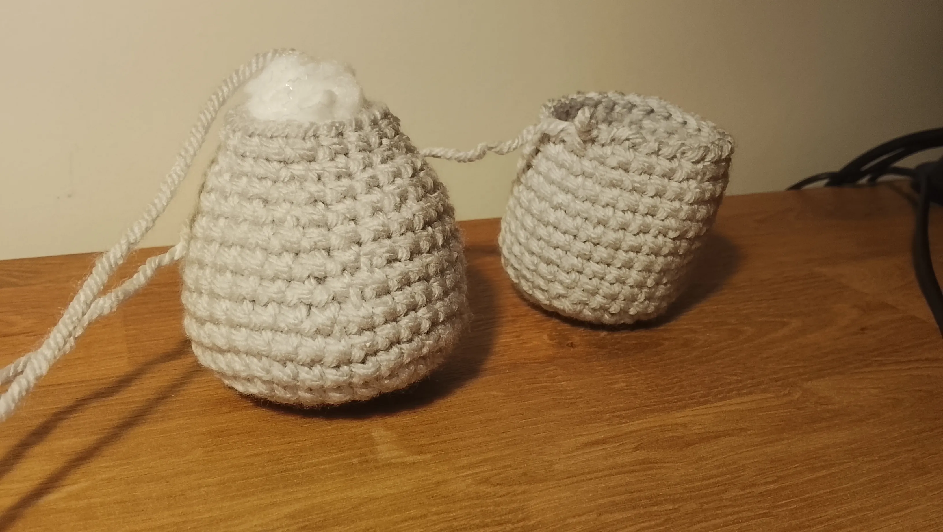 Two crochet bodies.